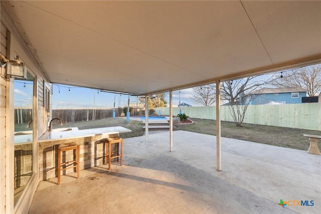 view of patio / terrace featuring a bar