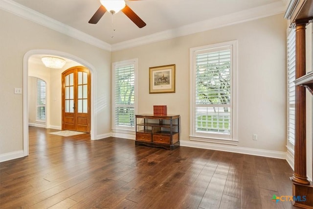 11421 Somerville Dr, Temple, TX 76502 - entrance foyer featuring arched walkways, healthy amount of natural light, hardwood / wood-style floors, and ornamental molding
