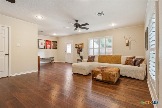 11421 Somerville Dr, Temple, TX 76502 - living area featuring ceiling fan, ornamental molding, dark wood finished floors, and recessed lighting