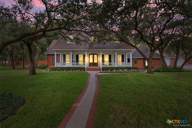 11421 Somerville Dr, Temple, TX 76502 - view of front of house with covered porch and a front yard