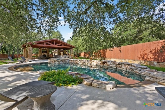 11421 Somerville Dr, Temple, TX 76502 - view of pool featuring a gazebo, a fenced backyard, a patio area, and a pool with connected hot tub