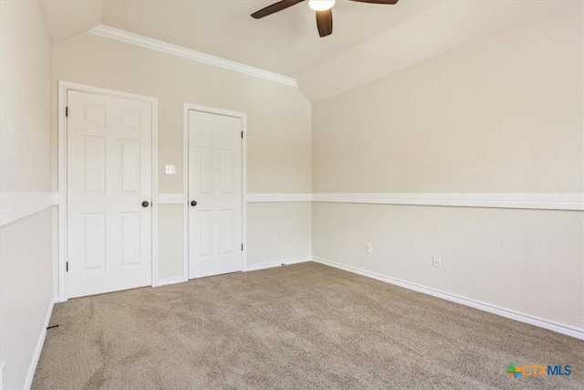 11421 Somerville Dr, Temple, TX 76502 - unfurnished bedroom with ornamental molding, carpet flooring, vaulted ceiling, and ceiling fan