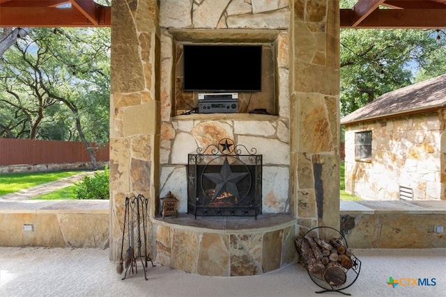11421 Somerville Dr, Temple, TX 76502 - detailed view of a warm lit fireplace and stone siding