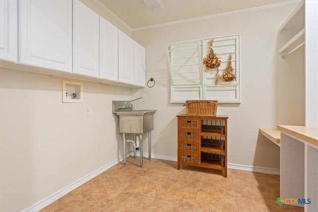 11421 Somerville Dr, Temple, TX 76502 - laundry area with hookup for a washing machine, crown molding, cabinet space, and an office area