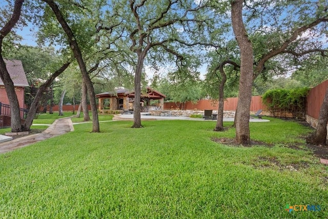 11421 Somerville Dr, Temple, TX 76502 - fenced backyard with a gazebo