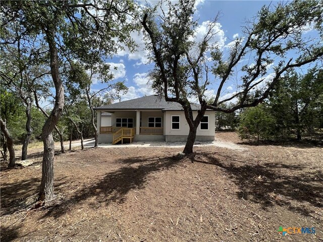 back of house with covered porch