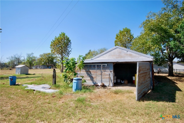 exterior space featuring a shed