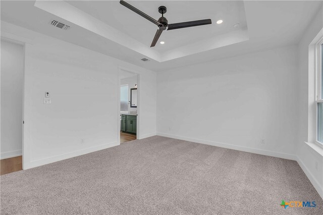 4146 Turning Leaf Dr, Nolanville, TX 76559 - unfurnished room featuring ceiling fan, carpet, and a tray ceiling
