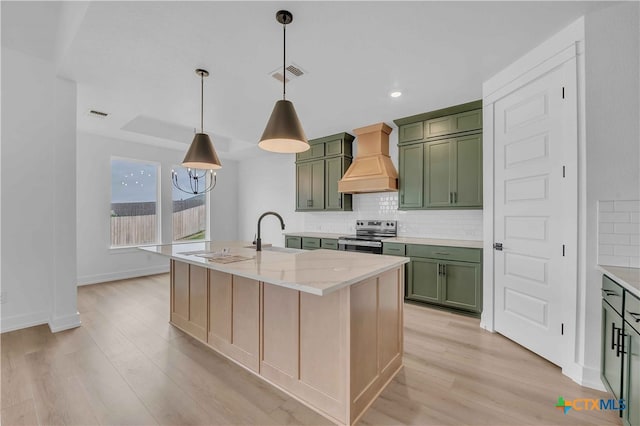 4146 Turning Leaf Dr, Nolanville, TX 76559 - kitchen featuring a sink, stainless steel range with electric stovetop, decorative backsplash, custom range hood, and green cabinets