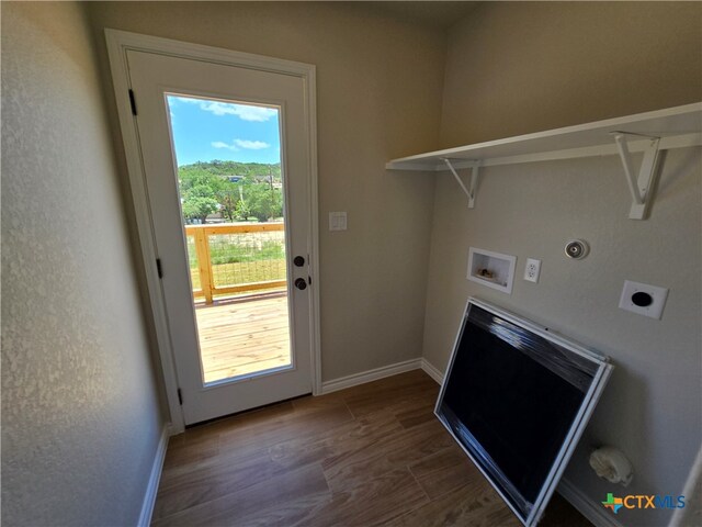 laundry room featuring hookup for a washing machine, hookup for a gas dryer, dark hardwood / wood-style floors, and hookup for an electric dryer