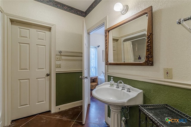 bathroom featuring sink and tile patterned floors