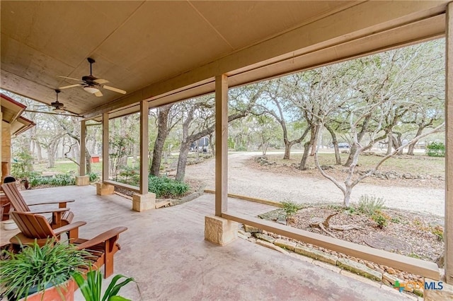 view of patio featuring ceiling fan