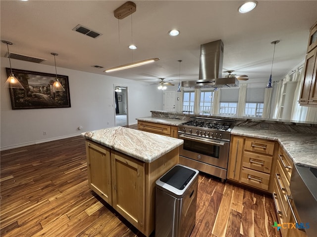 kitchen with visible vents, stainless steel stove, ceiling fan, island range hood, and dark wood finished floors