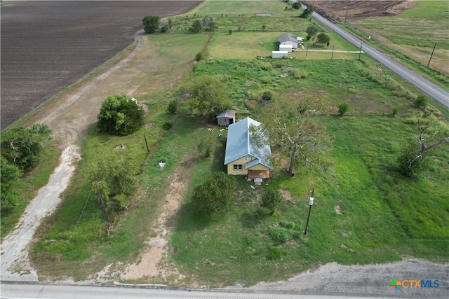 birds eye view of property featuring a rural view