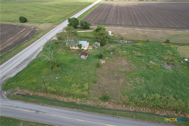 birds eye view of property featuring a rural view