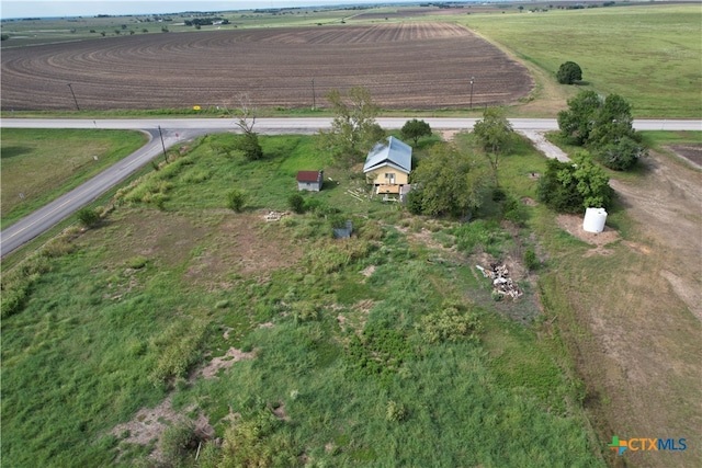 birds eye view of property featuring a rural view