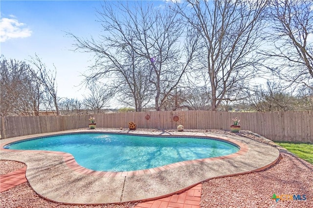 view of pool featuring a fenced in pool and a fenced backyard