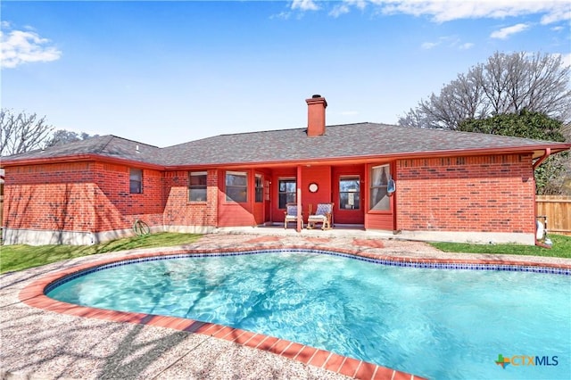 view of pool featuring a fenced in pool, a patio, and fence