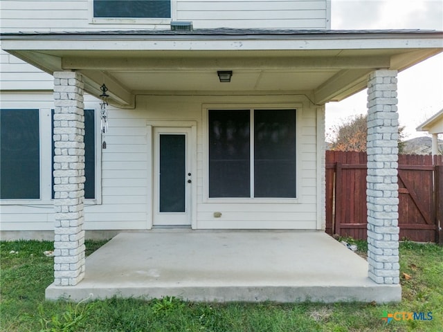 doorway to property featuring a patio area