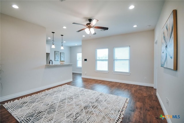 3611 Hanselman Rd, Victoria, TX 77901 - unfurnished living room featuring ceiling fan, wood finished floors, and recessed lighting