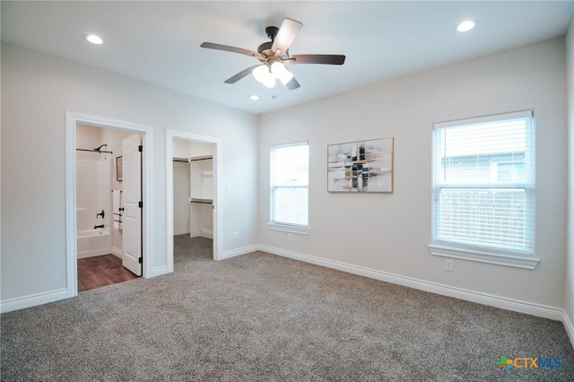 3611 Hanselman Rd, Victoria, TX 77901 - unfurnished bedroom with carpet floors, a walk in closet, recessed lighting, connected bathroom, and a ceiling fan