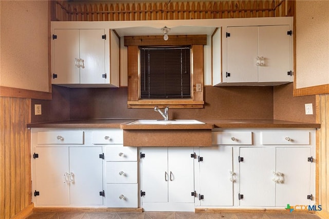 kitchen with sink and white cabinets