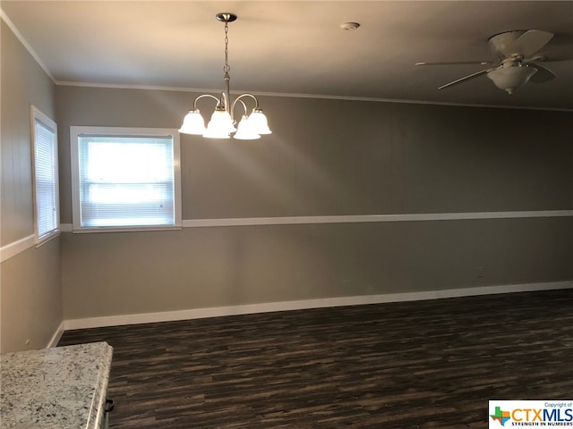 unfurnished room featuring dark hardwood / wood-style flooring, ceiling fan with notable chandelier, and crown molding