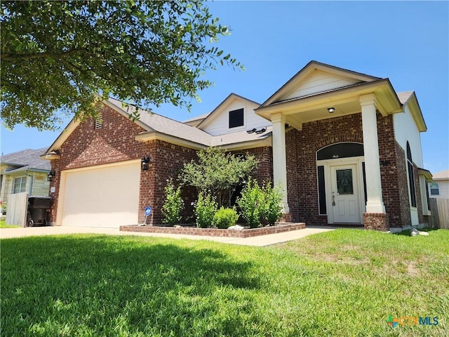 10004 Birch Tree Dr, Temple, TX 76502 - view of front of property with brick siding, a garage, and a front yard