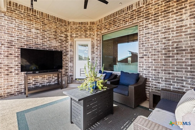 view of patio / terrace featuring a ceiling fan and outdoor lounge area