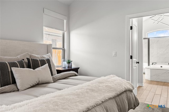 bedroom with light wood-style flooring