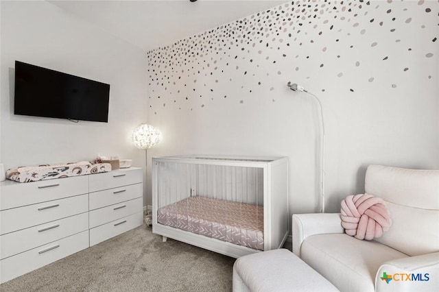 bedroom with vaulted ceiling and light colored carpet