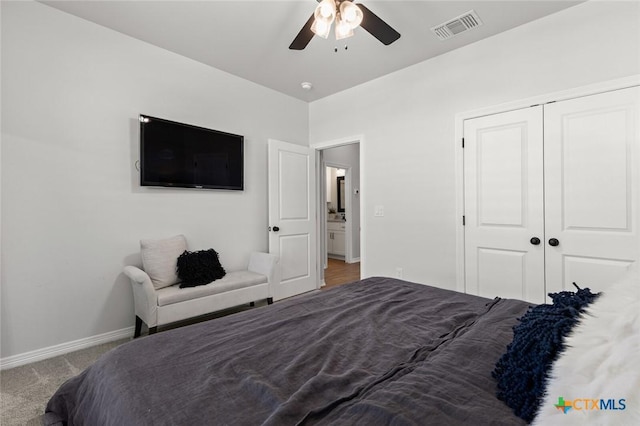 bedroom with carpet, a closet, visible vents, ceiling fan, and baseboards