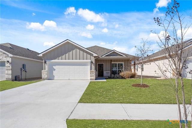 view of front of property with a porch, a front yard, and a garage