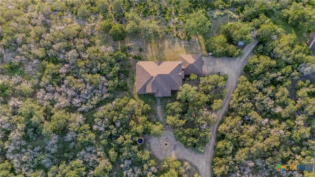 5310 River Oaks Dr, New Braunfels, TX 78132 - view of property exterior with stucco siding, a chimney, and a garage