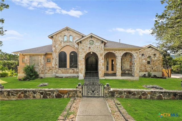 5310 River Oaks Dr, New Braunfels, TX 78132 - view of front of house featuring stone siding, a front lawn, and covered porch