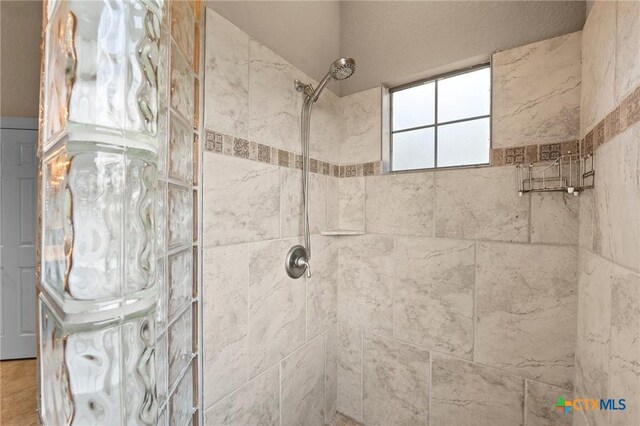 5310 River Oaks Dr, New Braunfels, TX 78132 - bedroom featuring crown molding, access to outside, light carpet, multiple windows, and arched walkways