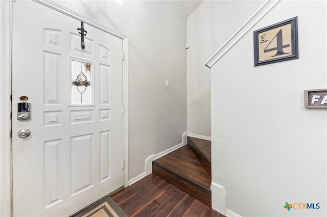 foyer featuring dark hardwood / wood-style floors