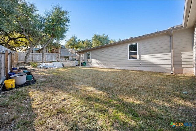 2803 American Dr, Lago Vista, TX 78645 - view of yard with a fenced backyard