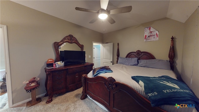 carpeted bedroom featuring ceiling fan and lofted ceiling