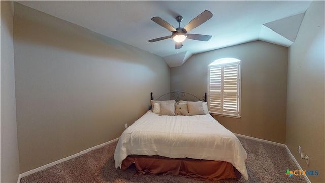 carpeted bedroom with ceiling fan and lofted ceiling