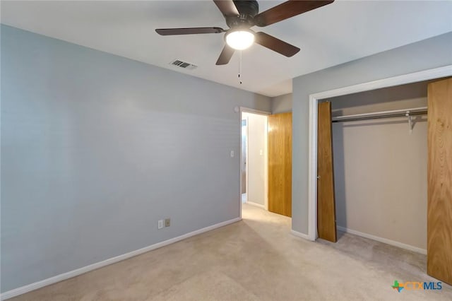 218 Sunset Dr, Victoria, TX 77901 - unfurnished bedroom with carpet floors, a closet, and a ceiling fan