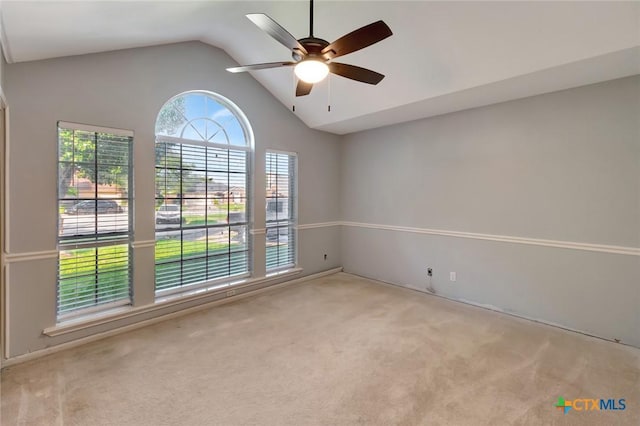 218 Sunset Dr, Victoria, TX 77901 - carpeted spare room with vaulted ceiling and ceiling fan