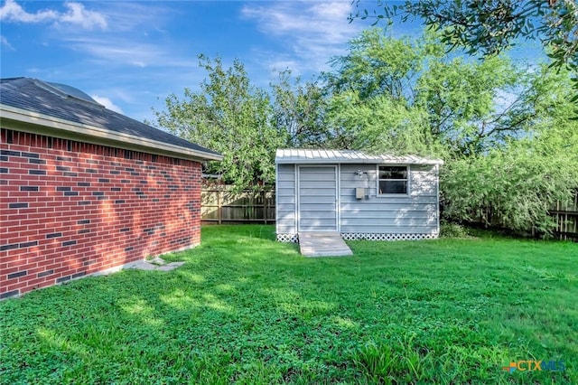 218 Sunset Dr, Victoria, TX 77901 - view of yard featuring a storage unit