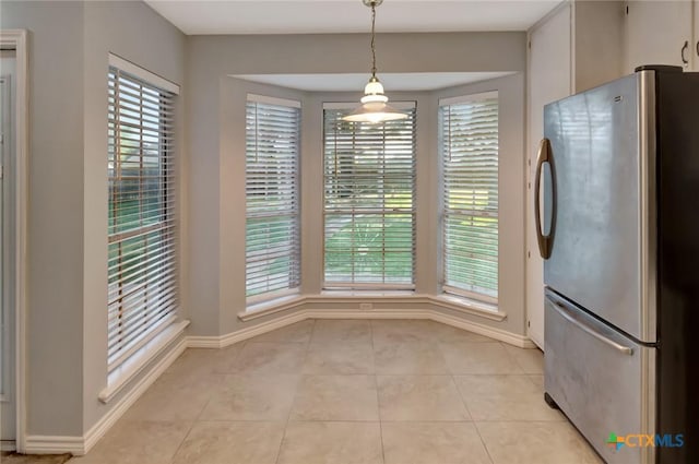 218 Sunset Dr, Victoria, TX 77901 - unfurnished dining area featuring light tile patterned floors