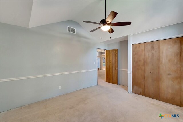 218 Sunset Dr, Victoria, TX 77901 - unfurnished bedroom featuring carpet flooring, a closet, ceiling fan, and high vaulted ceiling