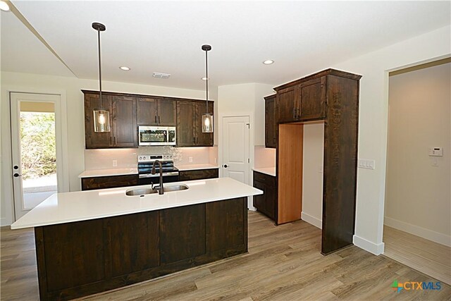 unfurnished living room featuring dark wood-type flooring, high vaulted ceiling, and a wealth of natural light