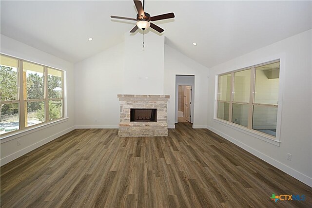 kitchen featuring sink, vaulted ceiling, dark brown cabinets, a kitchen island with sink, and dark hardwood / wood-style flooring