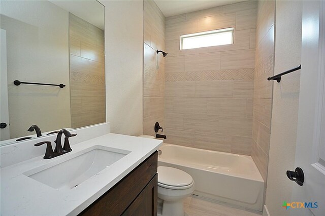 1598 Desiree St, Canyon Lake, TX 78133 - bathroom featuring toilet, vanity, and washtub / shower combination