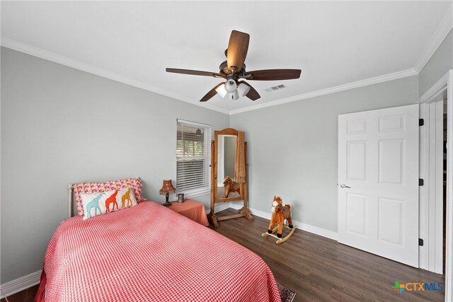 bedroom with dark wood-type flooring, ceiling fan, and crown molding