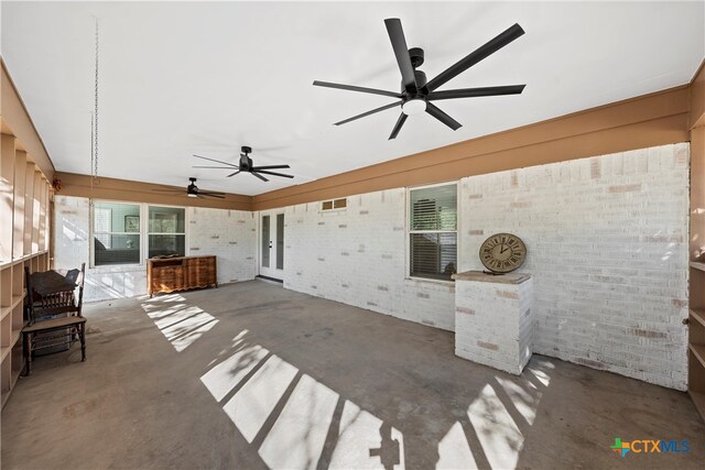 view of patio featuring ceiling fan